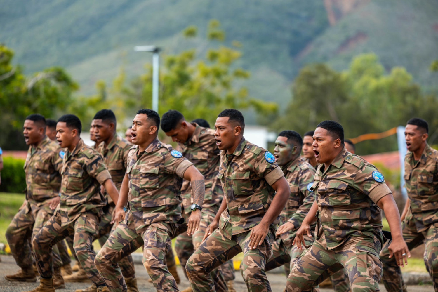 Members of His Majesty's Armed Forces of Tonga perform the traditional War Dance of Tonga during Exercise Croix du Sud 2025 in Plum, New Caledonia.